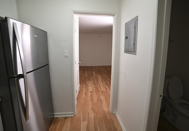 Building Photo - Newly remodeled studio in a gated building with pool and laundry room!