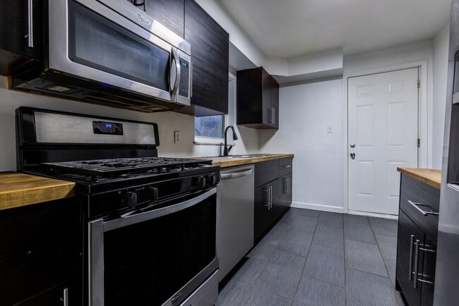 Building Photo - AVAILABLE APRIL - Open Concept 3 Bedroom Home w/ Character Throughout!