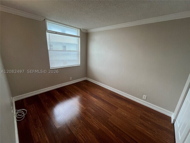 Building Photo - 8560 N Sherman Cir