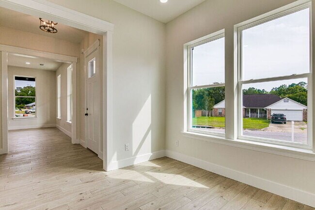 Building Photo - This luxurious new custom home in the sought-after Shadow Grove subdivision is a masterpiece of m...