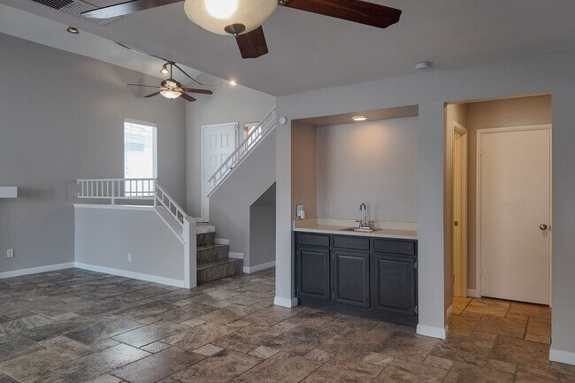 Building Photo - Modern Comfort with Pool & Spa in The Lakes – Solar Equipped Home