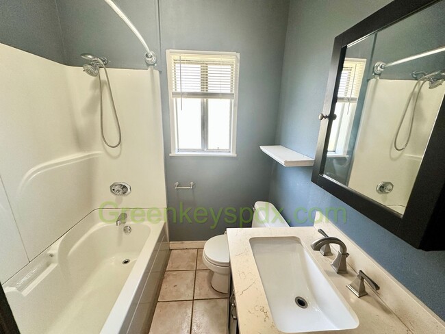 Building Photo - 3-Bedroom, 2-Bathroom House with Attached ...