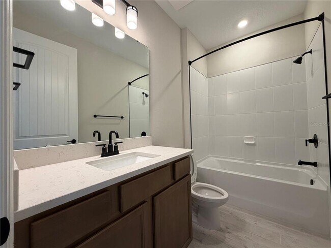 Building Photo - 5648 Flame Vine Wy