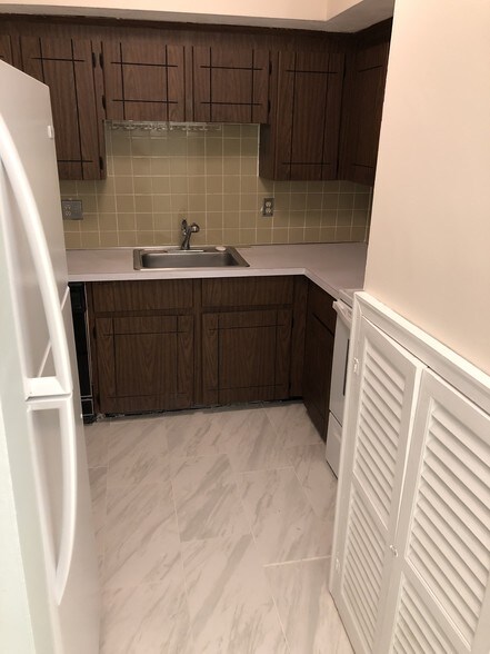 Entrance to Kitchen. New Fridge - 107 Oak Ln
