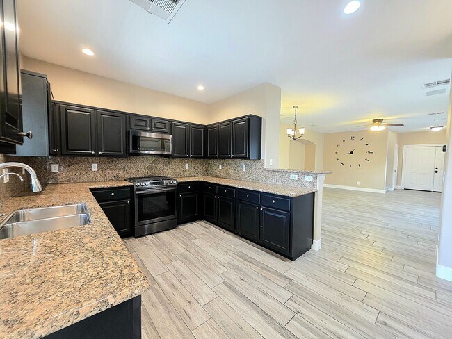Building Photo - Three-bedroom Single Family