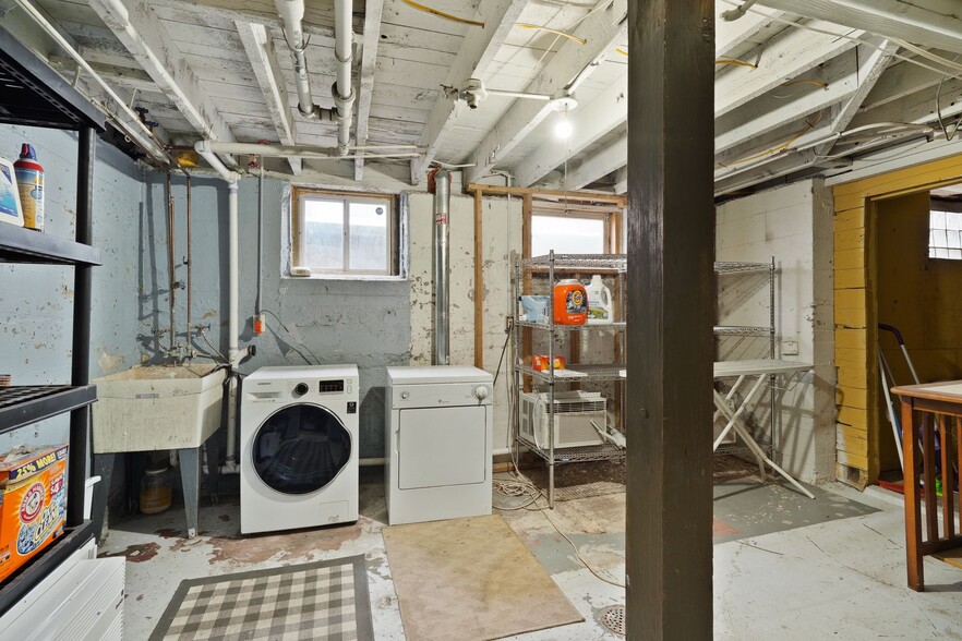 Clean, dry basement. Room for storage and workshop. - 3032 grand ave