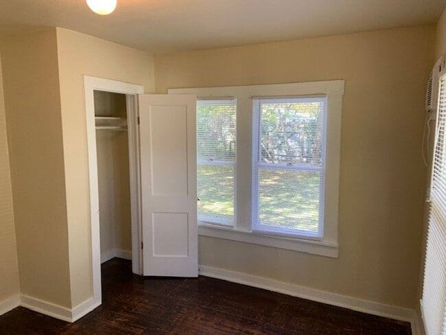 Building Photo - *COMING SOON* Charming Cottage Retreat with Fenced Yard!