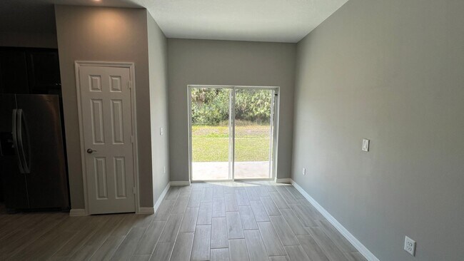 Building Photo - Smart & Stylish 3BD/2BA Palm Bay Home – Modern Upgrades, No Water Bills!