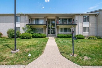 Building Photo - 8657 Kennedy Cir N