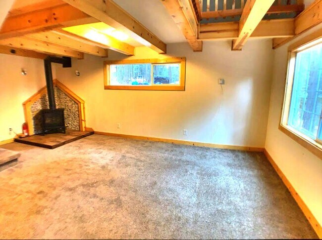 Building Photo - Adorable log cabin style home for rent near Hwy-50 and Safeway!