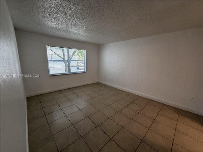 Building Photo - 4205 N University Dr