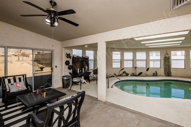 Building Photo - FURNISHED WITH INDOOR POOL