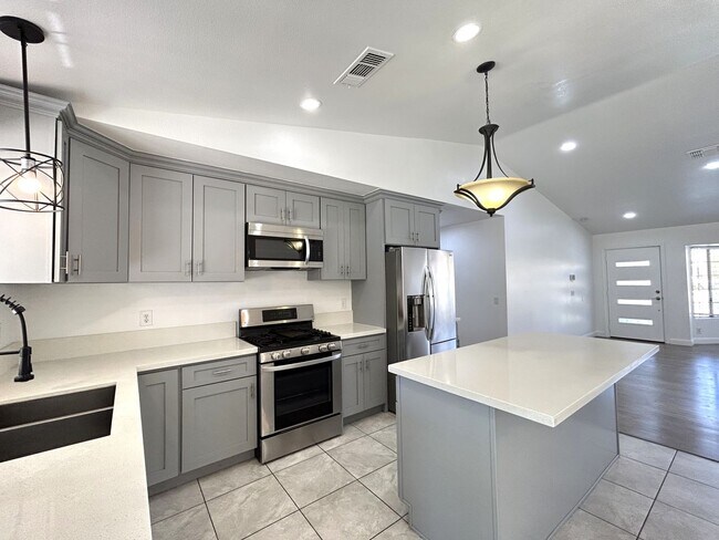 Building Photo - AVAILABLE NOW! GORGEOUS 3 Bedroom 2 Bathroom Cathedral City POOL HOME WITH SOLAR!