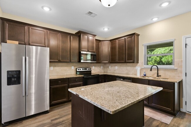 Building Photo - Spacious 5BR Home with Huge Fenced Backyard in The Reserve at Wyndham Gates!