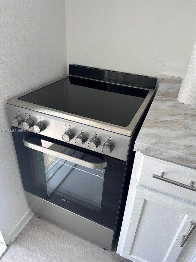 Building Photo - 9920 Collins Ave