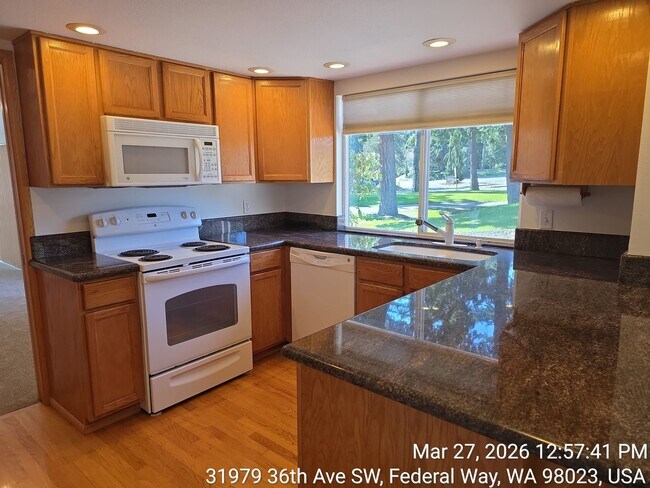 Building Photo - Twin Lakes life on a golf course -4 level home -  4 bedroom 2.5 bathroom with 2 car garage - Move...