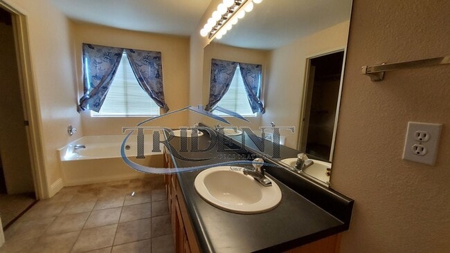 Building Photo - This is a large 4 bedroom, 3 bath SOLAR house with a bonus room upstairs