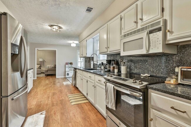 Building Photo - Charming Updated PTC Ranch just steps from...