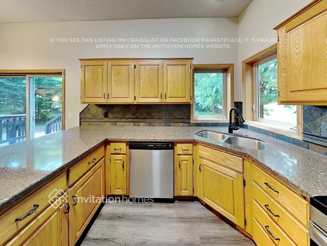 Building Photo - 5043 Ladyslipper Ave N