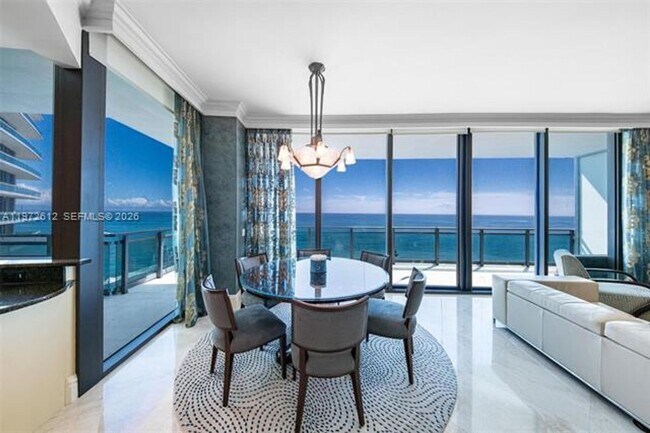 Building Photo - 10295 Collins Ave