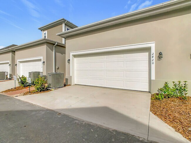 Building Photo - New Luxury Townhome in Celebration, FL Corner unit.  All porcelain tiled floors.  Aleutian model ...