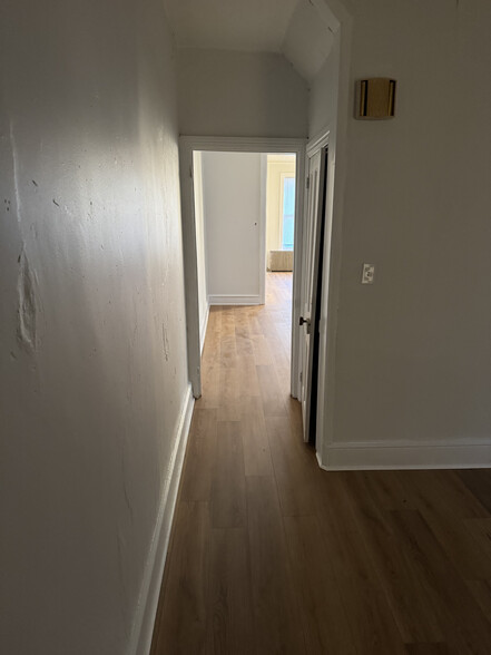 Rear room looking towards middle room. Closet on right. - 321 Lincoln Way W