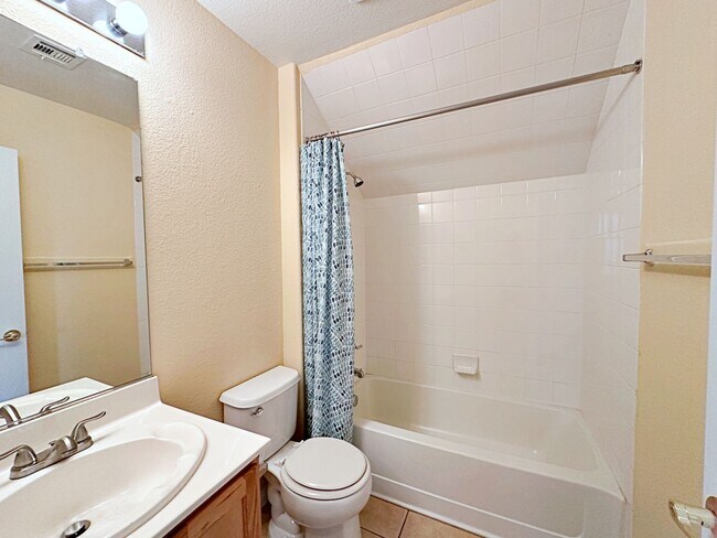 Building Photo - 4 BEDROOM HOME 3 CAR GARAGE ON A CORNER LO...