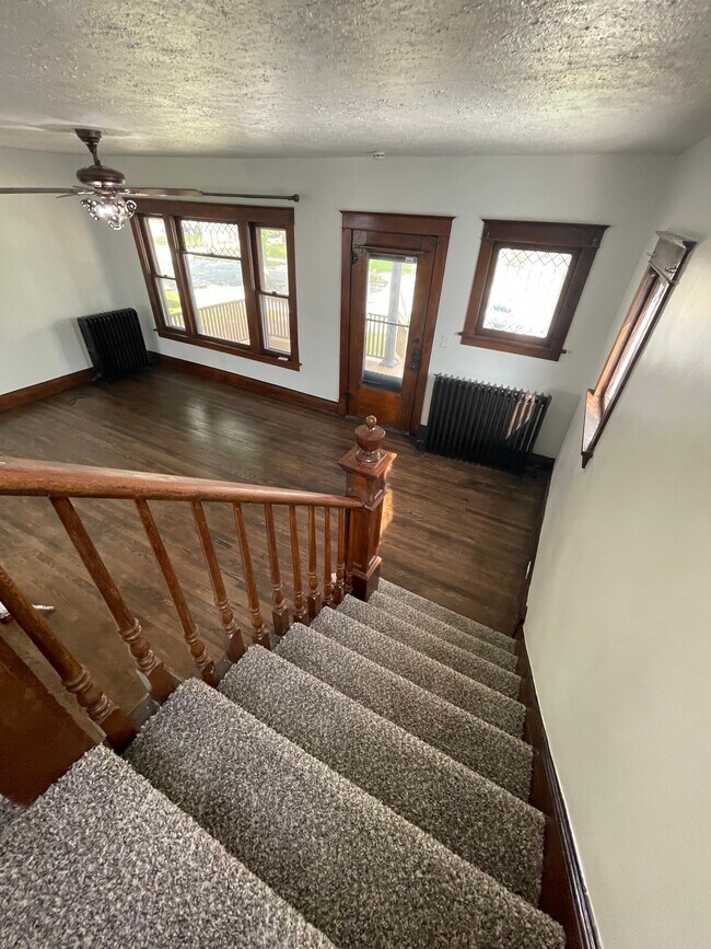 Staircase and Living room - 10212 Plymouth Ave