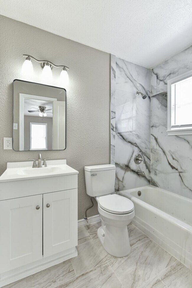 Building Photo - Beautifully Renovated 1BR Duplex with Marble Shower & Natural Light