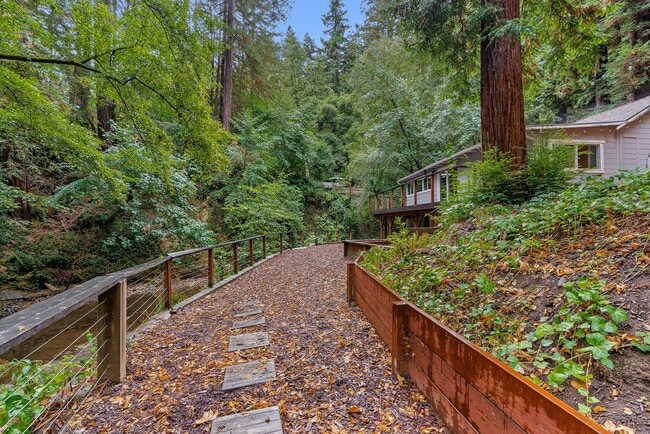 Building Photo - 1 Month FREE!! Riverfront Haven with Priva...