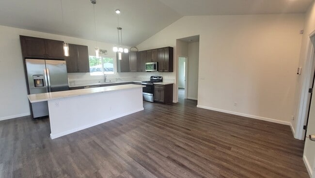 Building Photo - This 3-bedroom, 2-bath home in Orchidland Subdivision