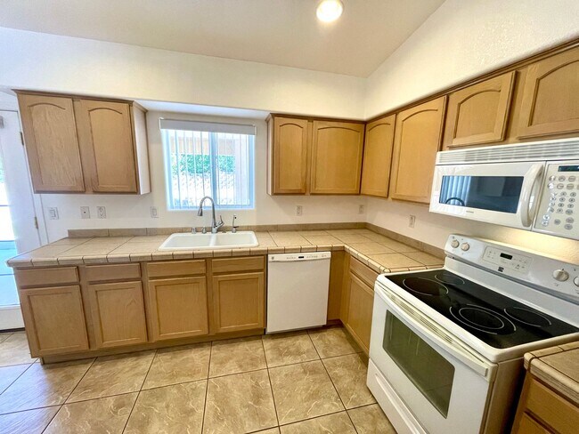 Building Photo - Inviting 3 Bedroom Home with RV Parking an...
