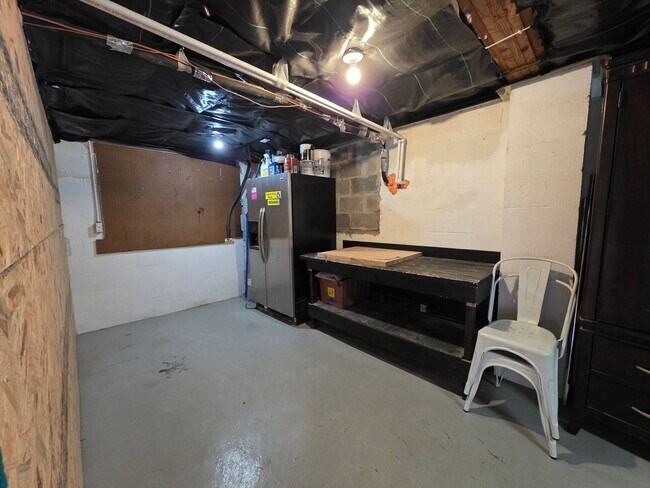 Building Photo - Charming 2BR with Walk-Out Basement, Fenced Yard & Flexible Murphy-Bed Office