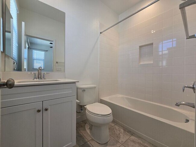 Building Photo - Modern Oceanside Home with Spacious Layout in a Desirable Community