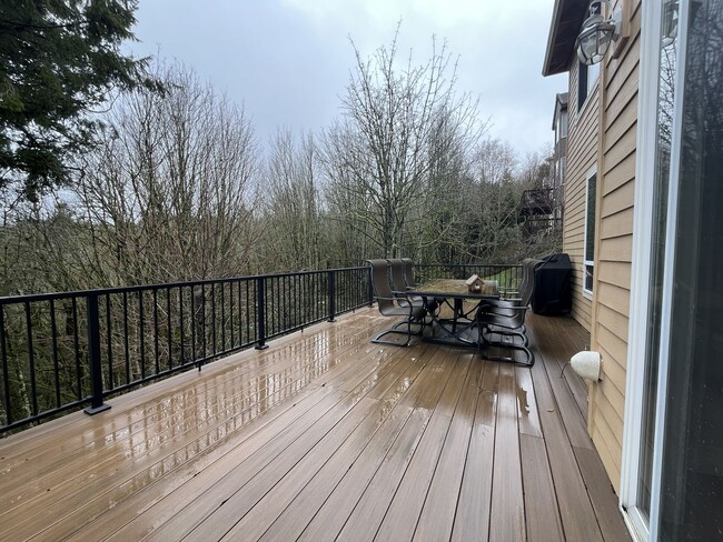 Building Photo - Executive-Style Northwest Heights Home with Forest Views and Refined Architectural Details