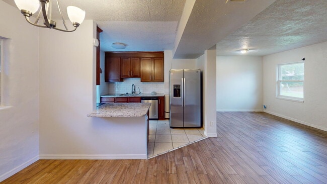 Building Photo - "Charming 3-Bedroom Home with Gleaming Hardwood Floors and 3 Full Baths on Camelot Rd, Jacksonvil...