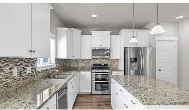 Building Photo - Your Next Home Awaits!