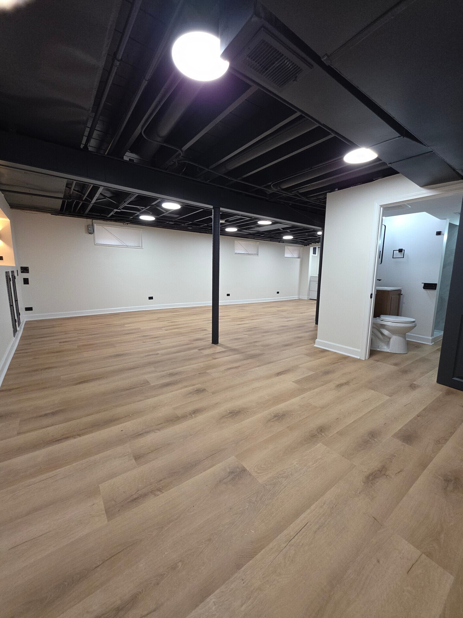 Family room / Bath #2 - Basement - 5251 S Hamlin Ave