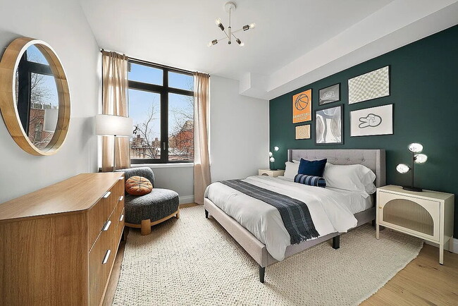 Building Photo - "Luxury 1-Bedroom Oasis with Pool & Elegant Finishes in Prime New York Location!"