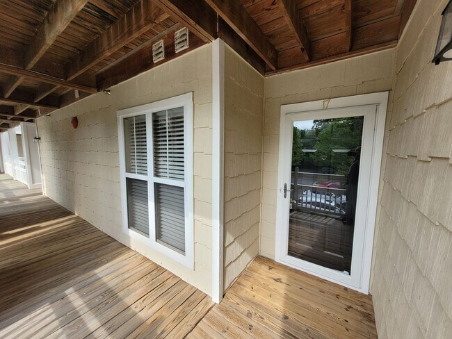 Building Photo - WATERFRONT - 3 Bed/2 Bath Condo - End Unit - Stunning View - Lake Access - Community Pool - Tenni...