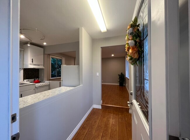 Kitchen to the Left as You Walk in - 11022 Leolang Ave