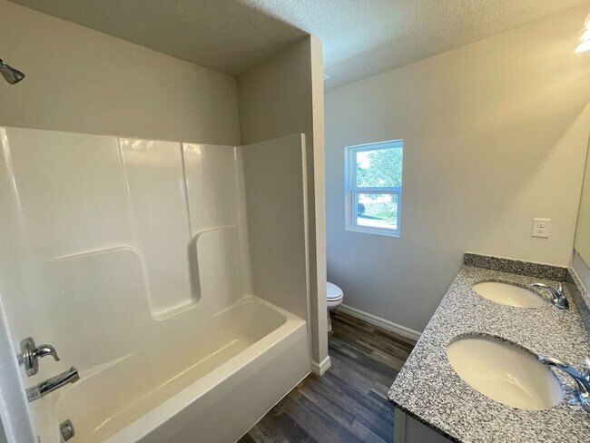 Building Photo - Poinciana Village-1630 Tench Ct Poinciana, FL 34759