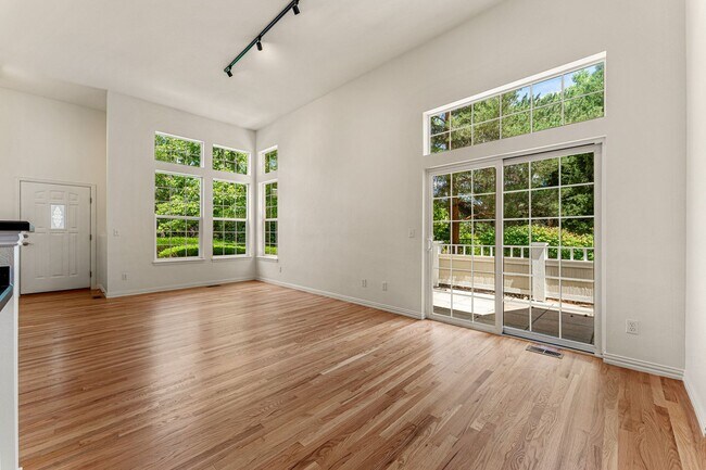 Building Photo - Gorgeous Townhome With 2-Car Garage and Ce...