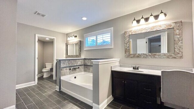 Building Photo - Stunning Cumming Executive Home, Hand Scraped Hardwoods, Custom Upgrades!