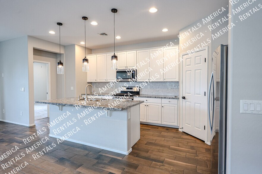 Building Photo - 5211 W Leodra Ln