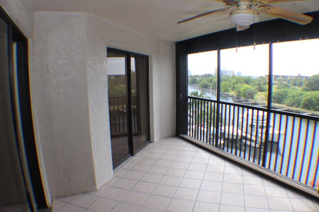 Building Photo - 2/2 Condo with Marina and River Views-Includes cable and water