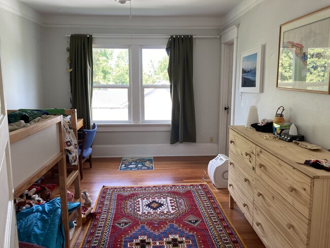 Middle bedroom has a big closet and east-facing windows. - 1405 NE Buffalo St