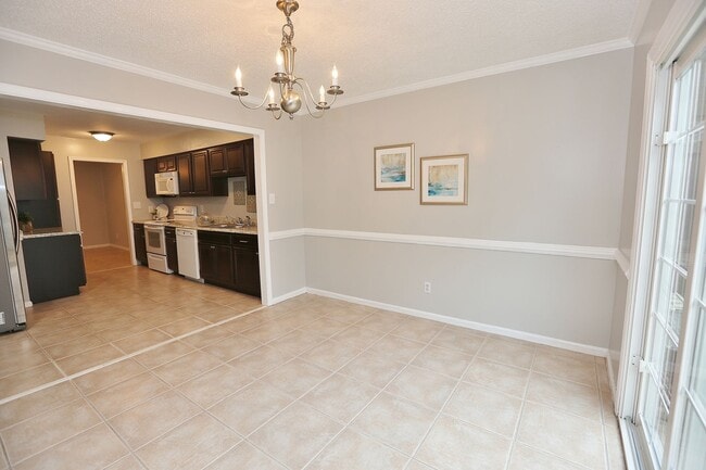 Building Photo - MUST SEE! Charming 3-Bedroom Townhome in Thoroughgood! 1-Car Attached Garage!