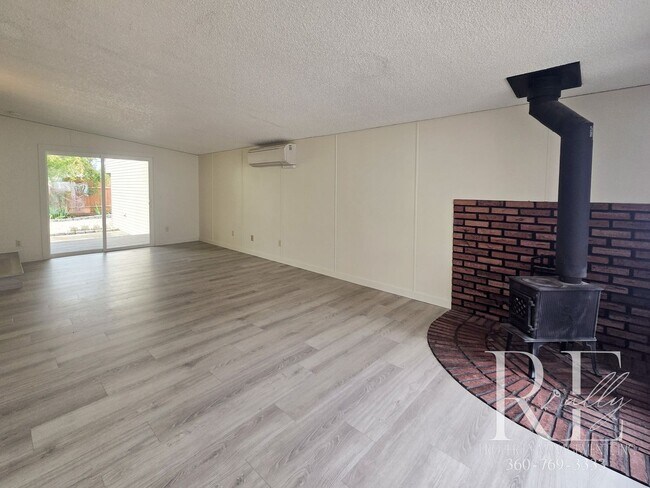Building Photo - Private Beach Access – Bright, Breezy Livi...