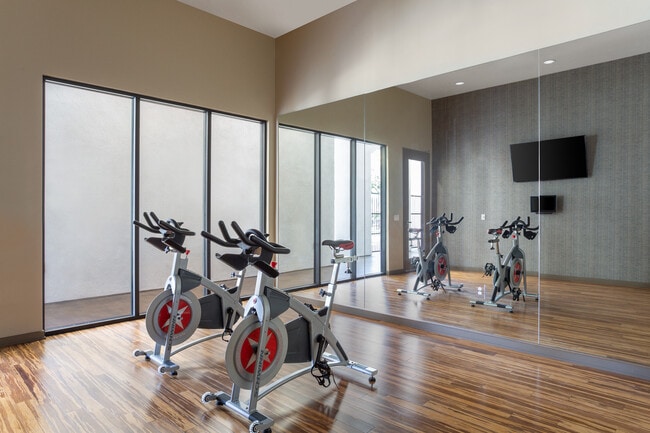 Stretch, spin, and center yourself close to home. - Vineyards at Paseo Del Sol